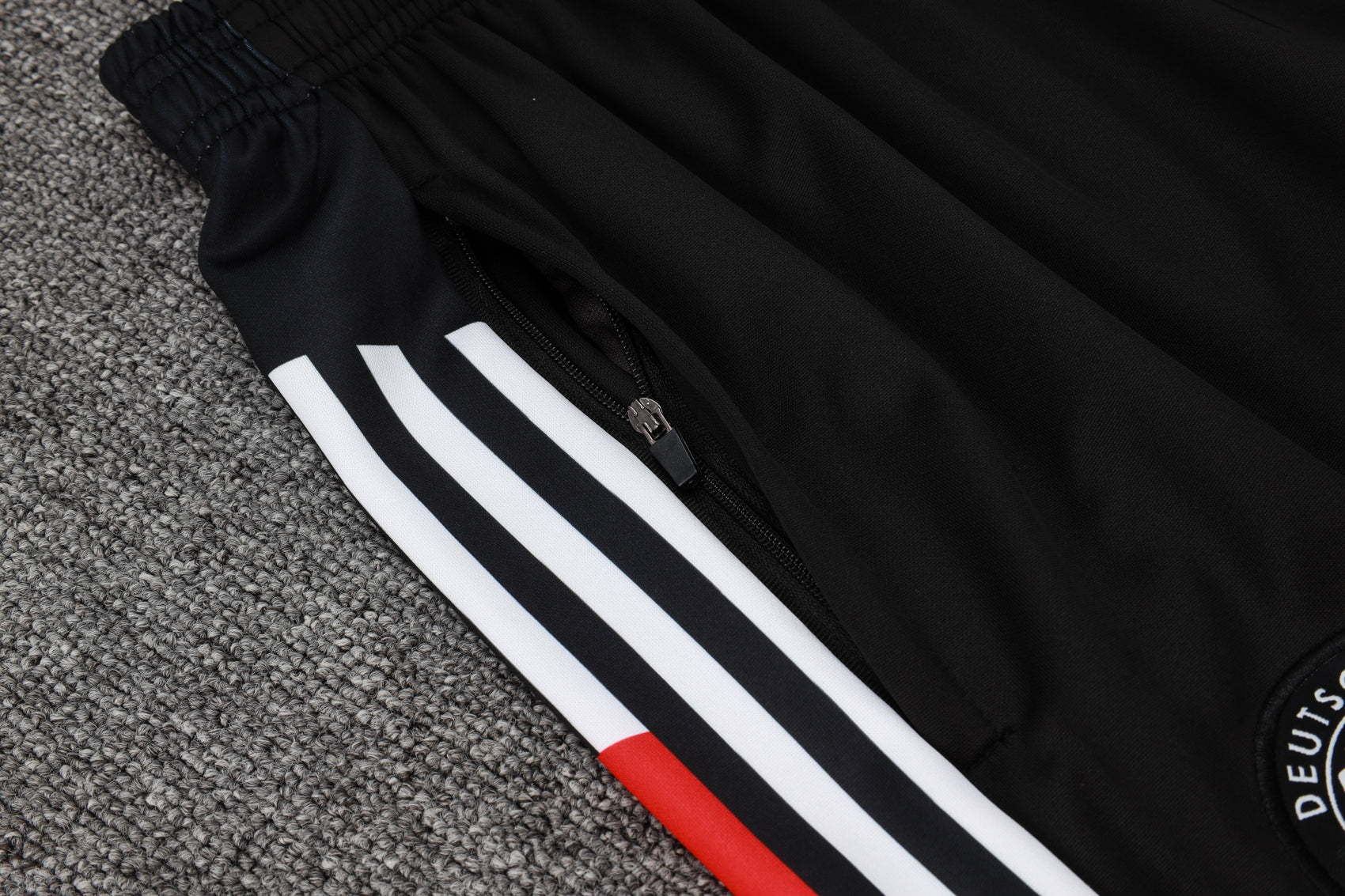 2024-25 German White (sleeves red, yellow and black) training suit