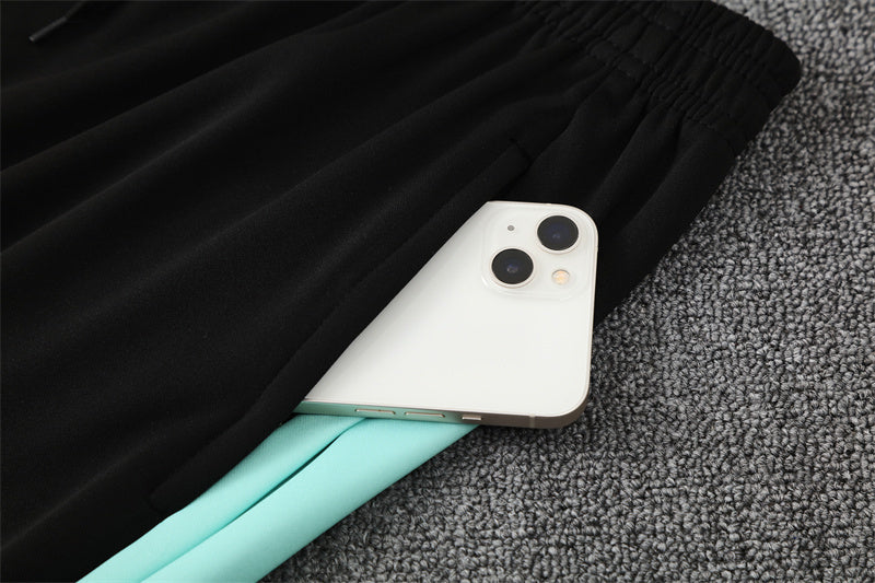 Traje de entrenamiento con estampado de camuflaje verde y negro de Portugal 2025-26