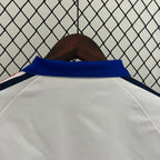 Gabardina reversible Francia 2024