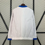 Gabardina reversible Francia 2024