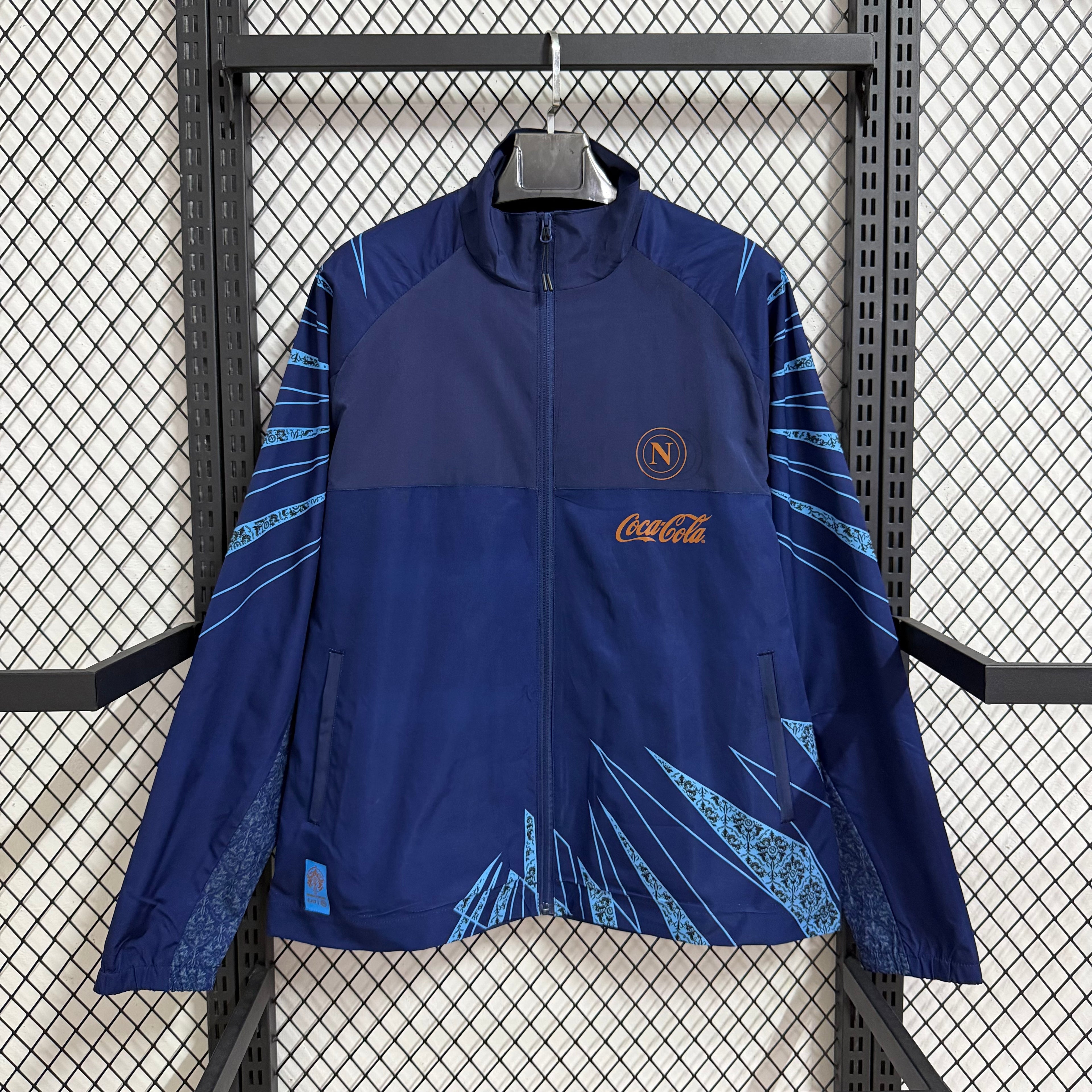 Cortavientos azul Napoli 2026-27