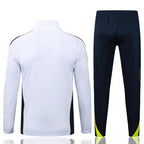 Chándal de entrenamiento blanco y verde con cremallera larga del Real Madrid 2025-26