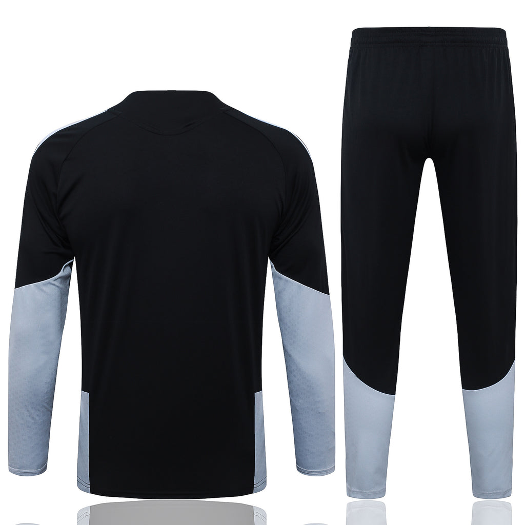 Traje de entrenamiento negro y gris del Real Madrid 2026-27