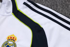 Chándal de entrenamiento blanco y verde con cremallera larga del Real Madrid 2025-26