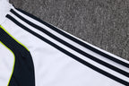 Chándal de entrenamiento blanco y verde con cremallera larga del Real Madrid 2025-26
