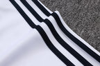 Chándal de entrenamiento blanco y verde con cremallera larga del Real Madrid 2025-26