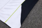 Chándal de entrenamiento blanco y verde con cremallera larga del Real Madrid 2025-26