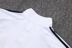 Chándal de entrenamiento blanco y verde con cremallera larga del Real Madrid 2025-26