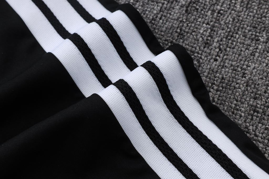 Traje de entrenamiento negro y gris del Real Madrid 2026-27