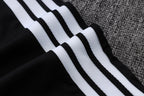 Traje de entrenamiento negro y gris del Real Madrid 2026-27