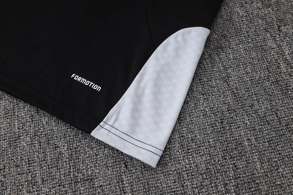 Traje de entrenamiento negro y gris del Real Madrid 2026-27