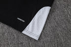 Traje de entrenamiento negro y gris del Real Madrid 2026-27