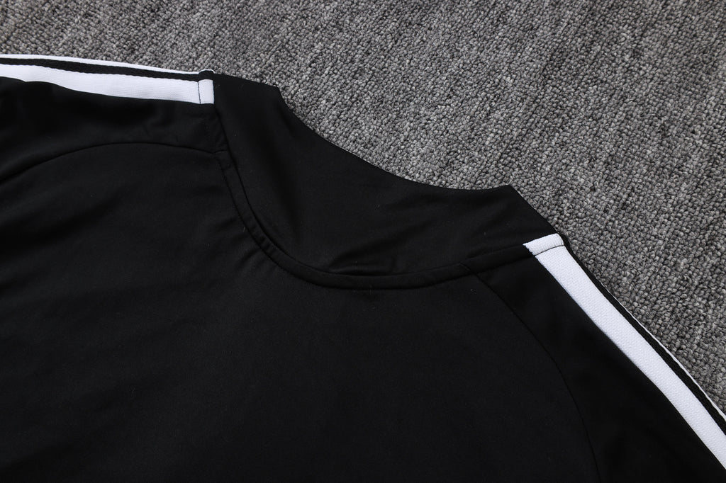 Traje de entrenamiento negro y gris del Real Madrid 2026-27