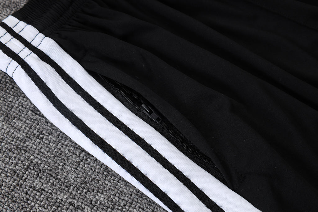 Traje de entrenamiento negro y gris del Real Madrid 2026-27