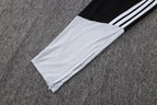 Traje de entrenamiento negro y gris del Real Madrid 2026-27