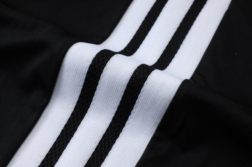 Traje de entrenamiento negro y gris del Real Madrid 2026-27