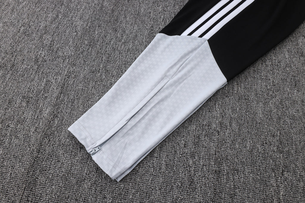 Traje de entrenamiento negro y gris del Real Madrid 2026-27