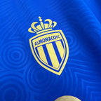 Versión para aficionados azul visitante del Mónaco 2025-26
