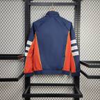 Chaqueta cortavientos negra y roja del Arsenal 2025-26