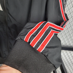 Chaqueta cortavientos negra del Manchester United 2025-26