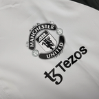 Chaqueta cortavientos blanca del Manchester United 2025-26