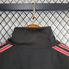 Chaqueta cortavientos negra del Manchester United 2025-26