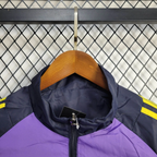 Cortavientos azul-morado del Real Madrid 2025-26