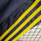 Cortavientos azul-morado del Real Madrid 2025-26